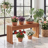 Solid wooden 2-person outdoor garden bench with potted plants, ideal for backyard or indoor use.