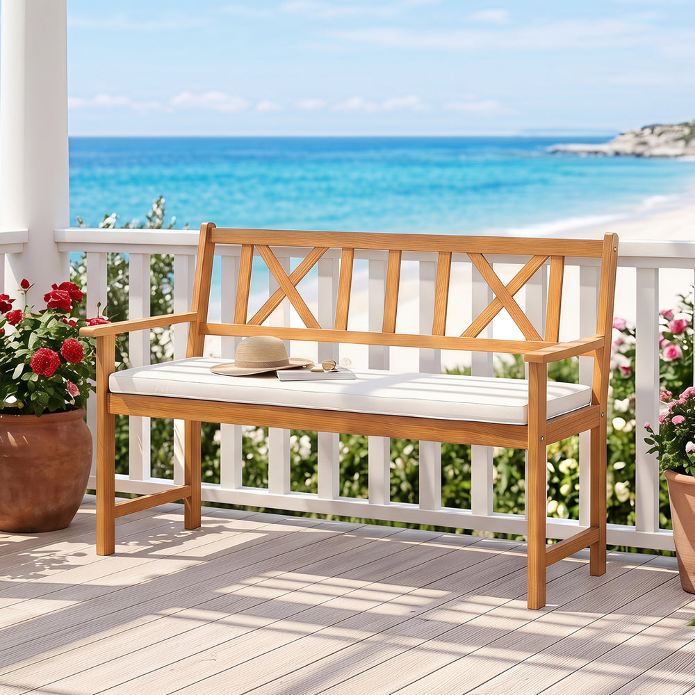 Acacia wood garden chair features a supportive x-shaped backrest and removable seat cushion, ideal for outdoor patios.