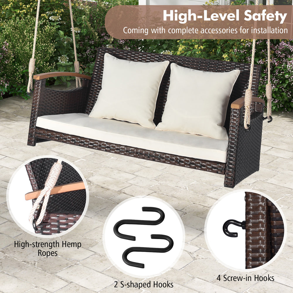 2-person patio rattan porch swing with cushions, heavy-duty metal structure, and sturdy hemp ropes for backyard.