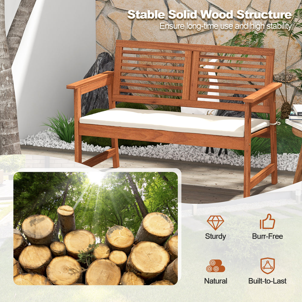 2-person solid wood patio bench with backrest and cushions, featuring a natural wood finish for backyard relaxation.