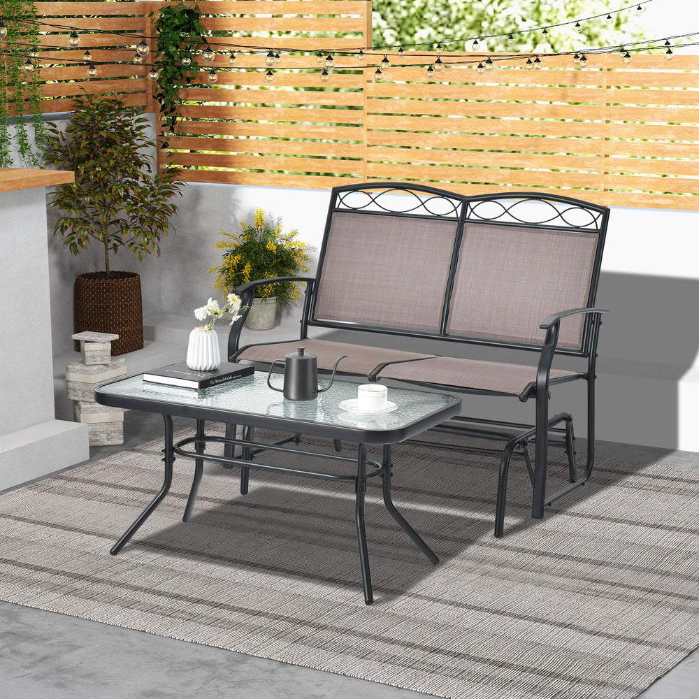 Outdoor gliding loveseat chair with tempered glass coffee table, featuring ergonomic design and rustproof metal frame.