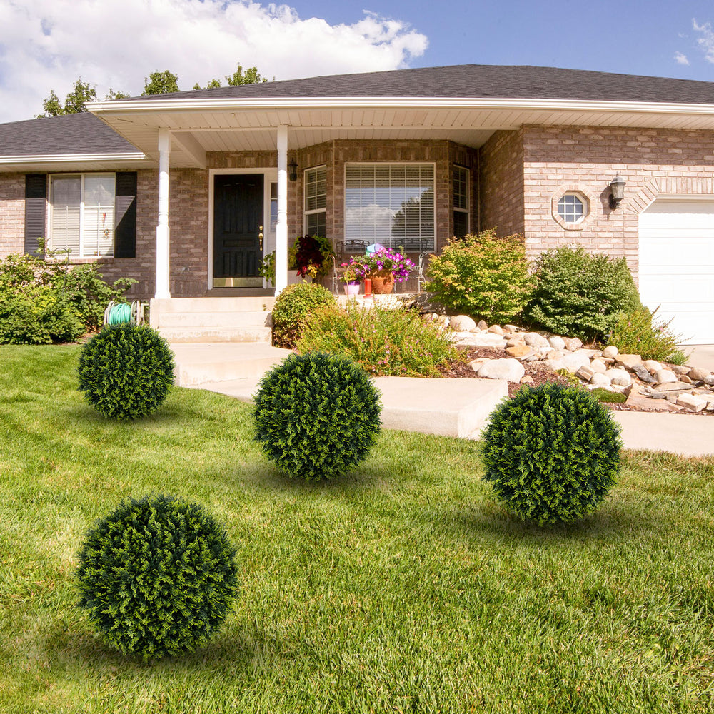 Two 18-inch faux decorative balls in lush green, ideal for patio and garden decoration, requiring no maintenance.