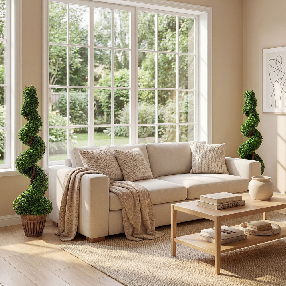 Artificial boxwood spiral tree set with natural trunks and PVC leaves, perfect for indoor or outdoor decoration.