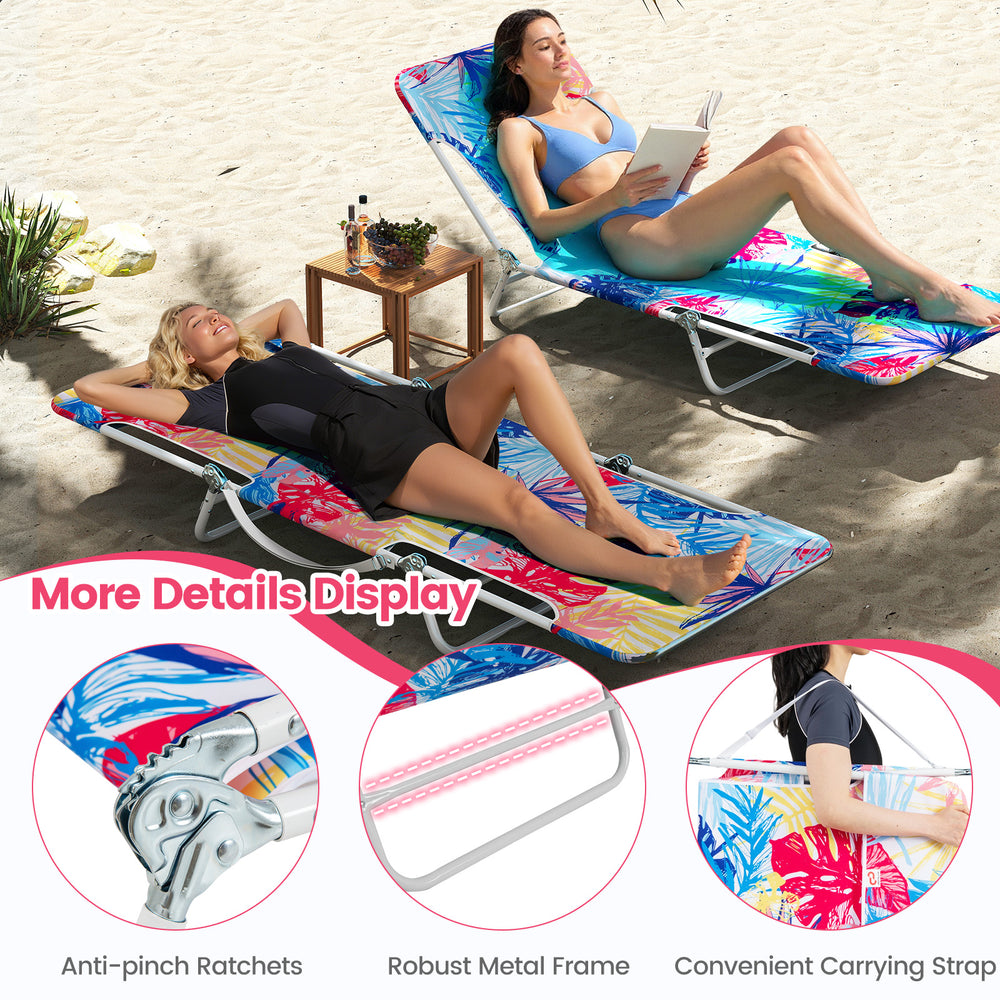 Two pink beach recliners with adjustable backrests and carrying straps, perfect for camping or poolside relaxation.