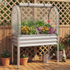 Galvanized raised garden bed with greenhouse cover, featuring vibrant flowers, elevated design for comfortable.