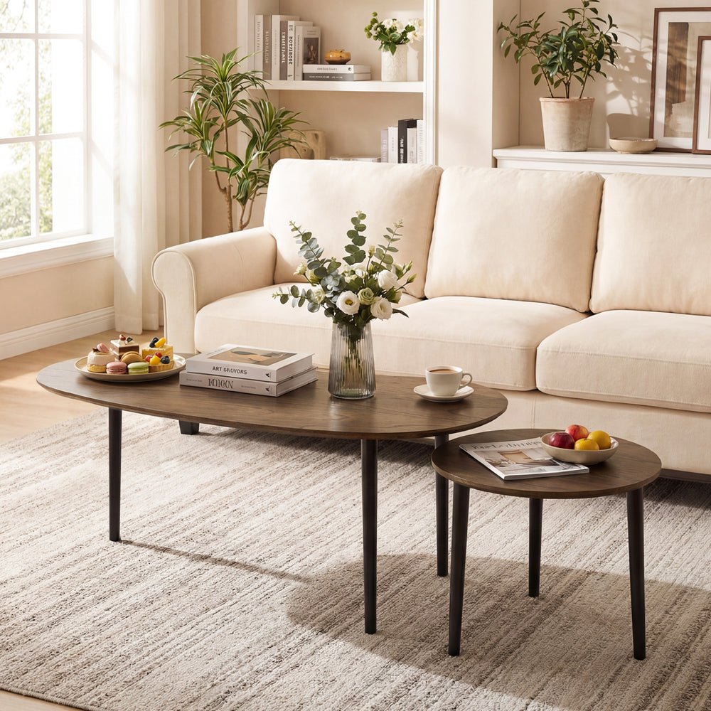 Mid-century nesting tables with walnut finish and rubber wood legs, perfect for living room or bedroom use.