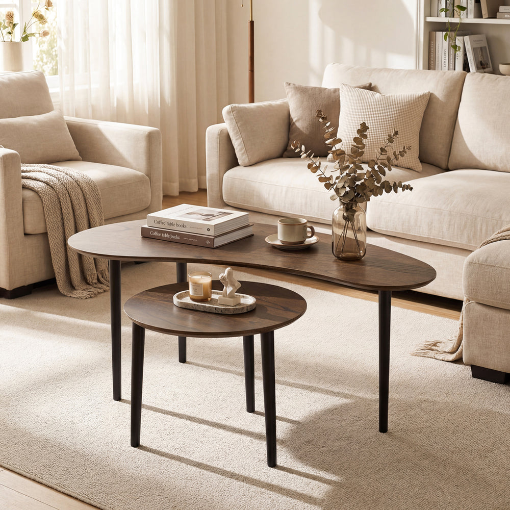 Mid-century nesting tables with rubber wood legs in walnut finish, ideal for versatile use in living spaces.