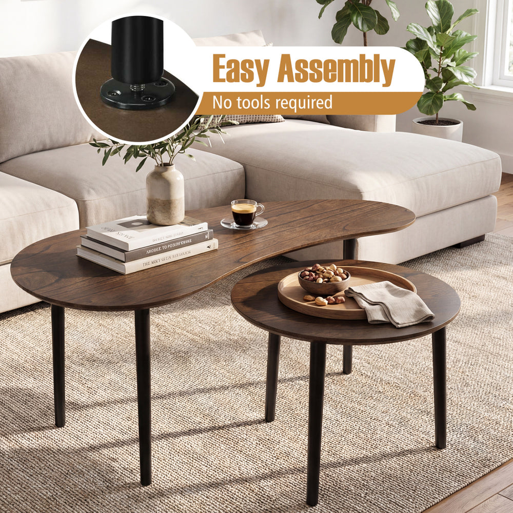 Mid-century nesting tables with walnut finish and rubber wood legs, perfect as coffee tables or side tables for.