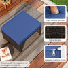 Navy blue PE rattan ottoman with high-density sponge cushion, ideal as a footrest or extra seating for outdoor spaces.