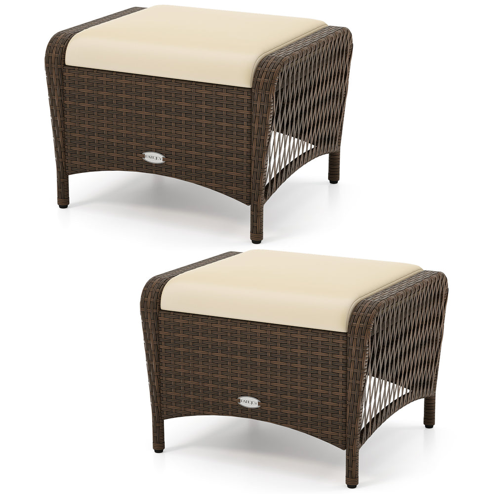 Set of 2 outdoor patio PE wicker ottomans with beige removable cushions, ideal for extra seating or footrests.
