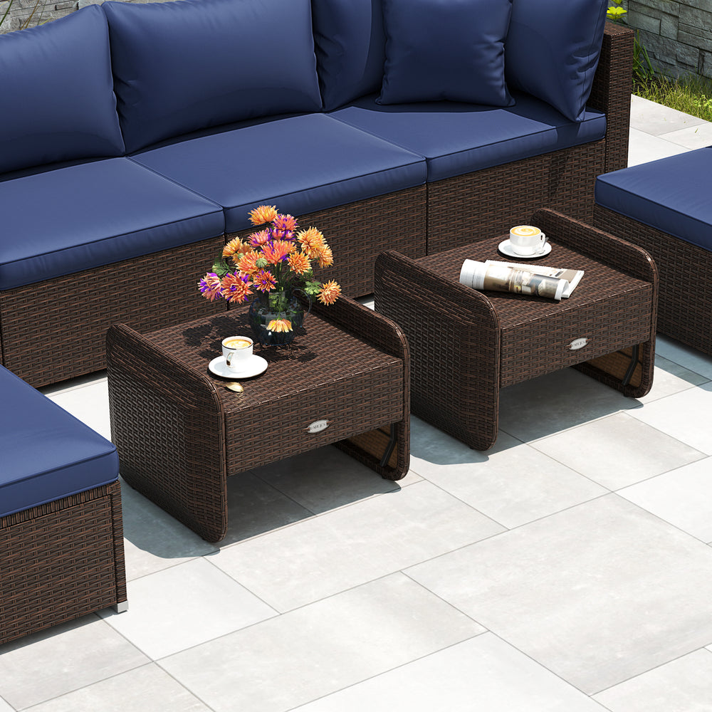 Two outdoor patio PE wicker ottomans with navy removable cushions, perfect for extra seating or as coffee tables.
