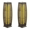Two solar-powered square wicker floor lamps in light brown, providing warm yellow light for outdoor use.
