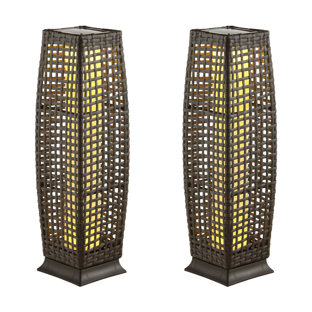Two solar-powered square wicker floor lamps in brown, featuring warm LED light for outdoor use, with a stable base.