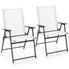White patio folding chairs with armrests, sturdy metal frame, portable design, ideal for deck and garden use.