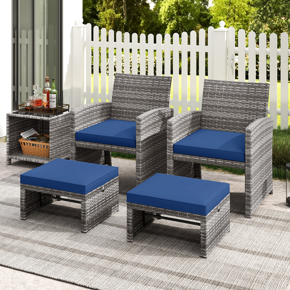 Navy blue PE rattan ottomans with soft zippered cushions, perfect as footrests or extra seating for outdoor spaces.