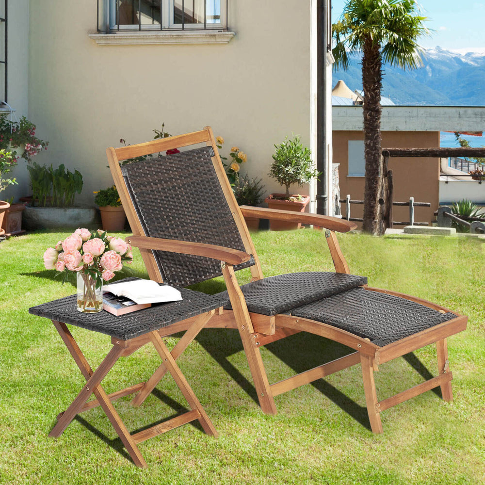 Folding lounge chair set with acacia wood table, featuring brown PE wicker, perfect for patio and garden relaxation.