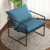 Navy sling accent chair with soft cushions and durable metal frame, perfect for indoor or outdoor relaxation.