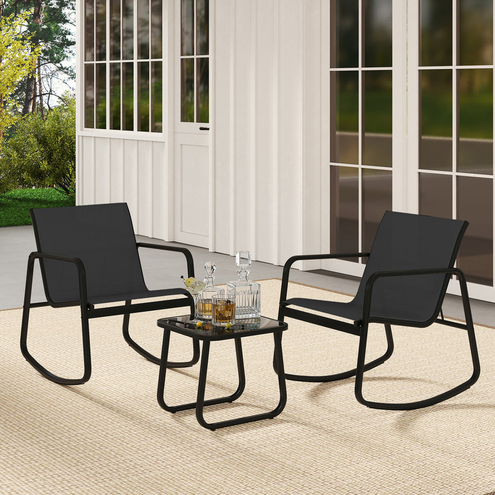 Two black rocking bistro chairs with a glass-top table, perfect for relaxing on the porch or balcony.