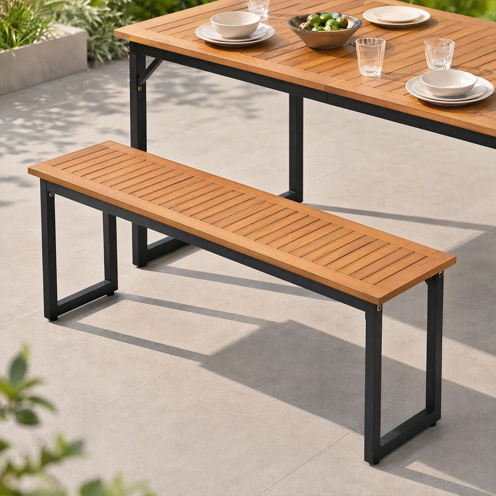 Acacia wood 2-seater outdoor dining bench with metal legs, featuring a slatted surface for breathability and easy cleaning.