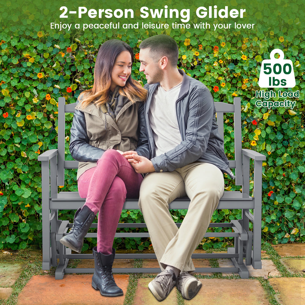 2-person outdoor glider bench in gray with armrests, slatted seat, and 500 lbs capacity for garden or patio relaxation.