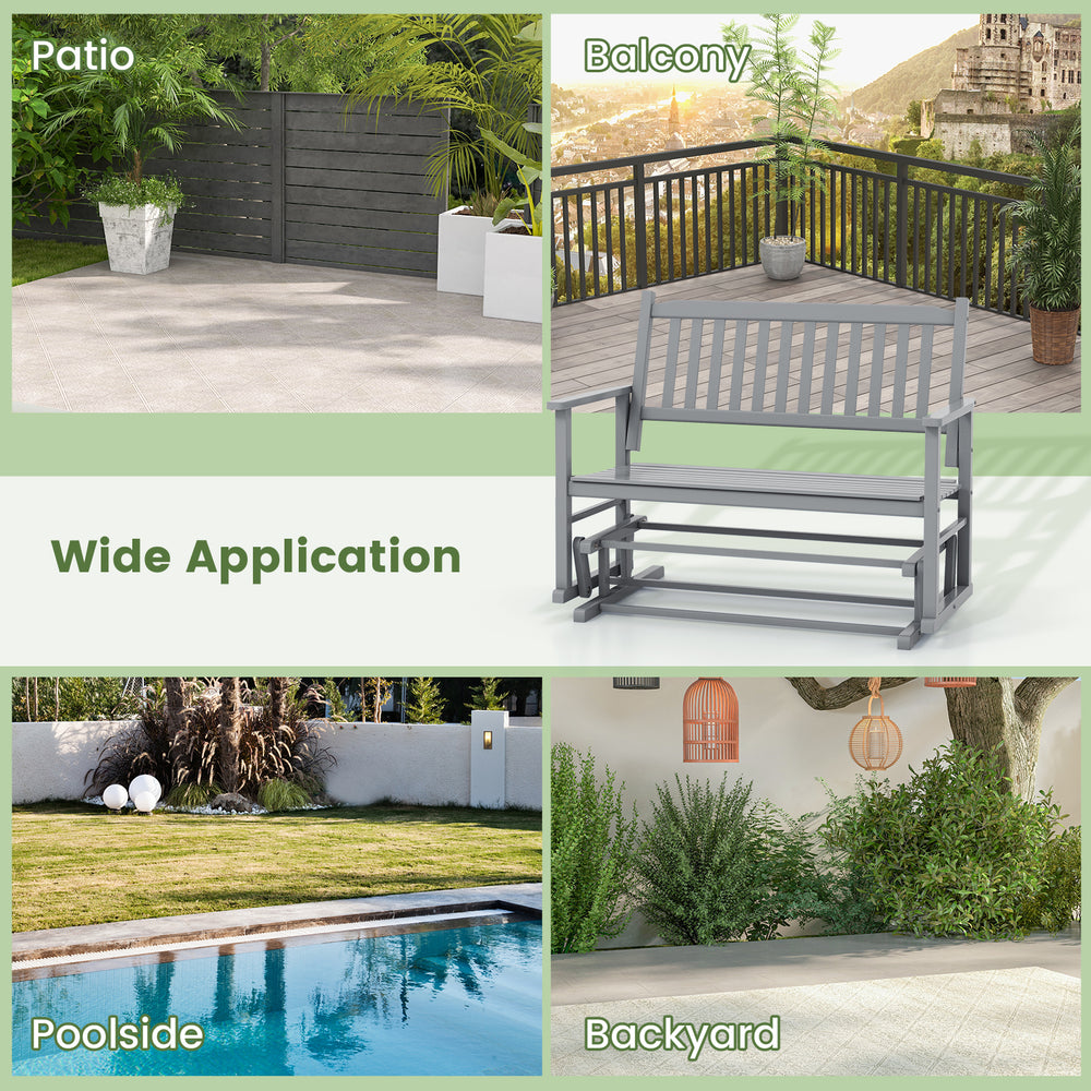 Gray 2-seat outdoor glider bench with armrests, slatted seat, ideal for patio, balcony, or poolside relaxation.