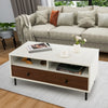 Modern rectangle coffee table with white color blocking design, two shelves, and drawers for stylish storage in living.
