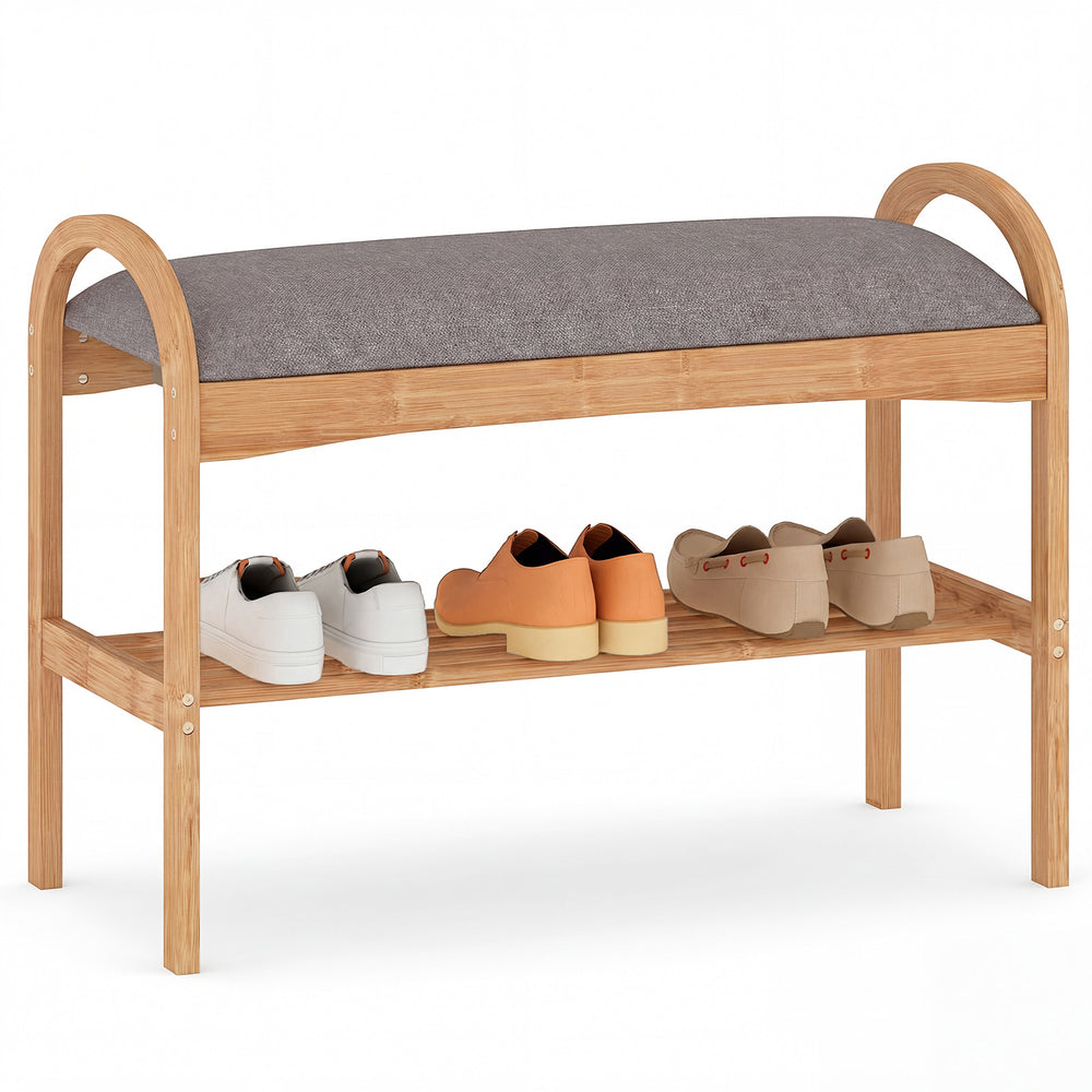 Bamboo shoe bench with gray padded cushion and slatted shelf, ideal for hallway or entryway shoe storage.