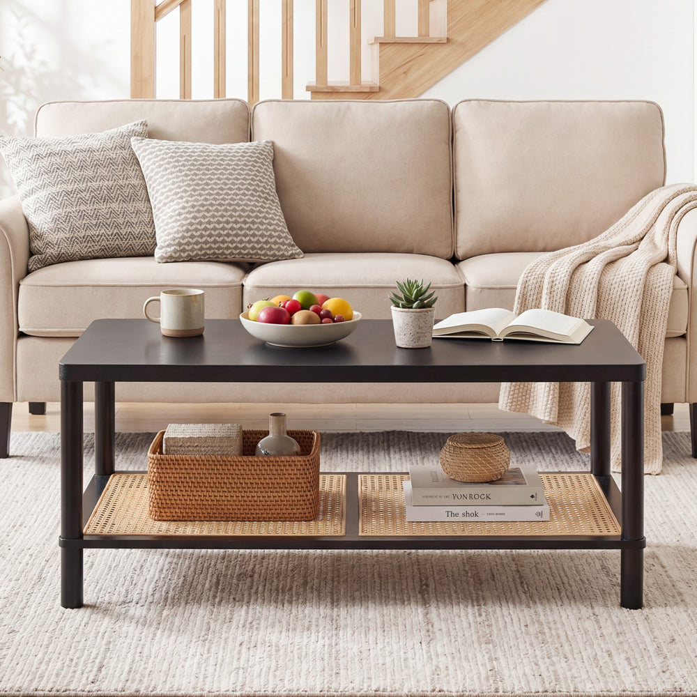 Boho coffee table featuring a spacious top with a stylish rubber wood frame and a PVC rattan shelf for organized.