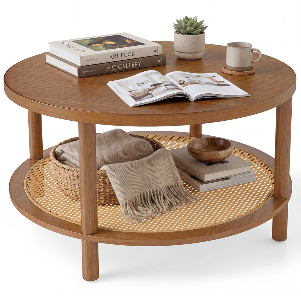 Boho round rattan coffee table in walnut with a storage shelf, styled with books and decor for a cozy living space.