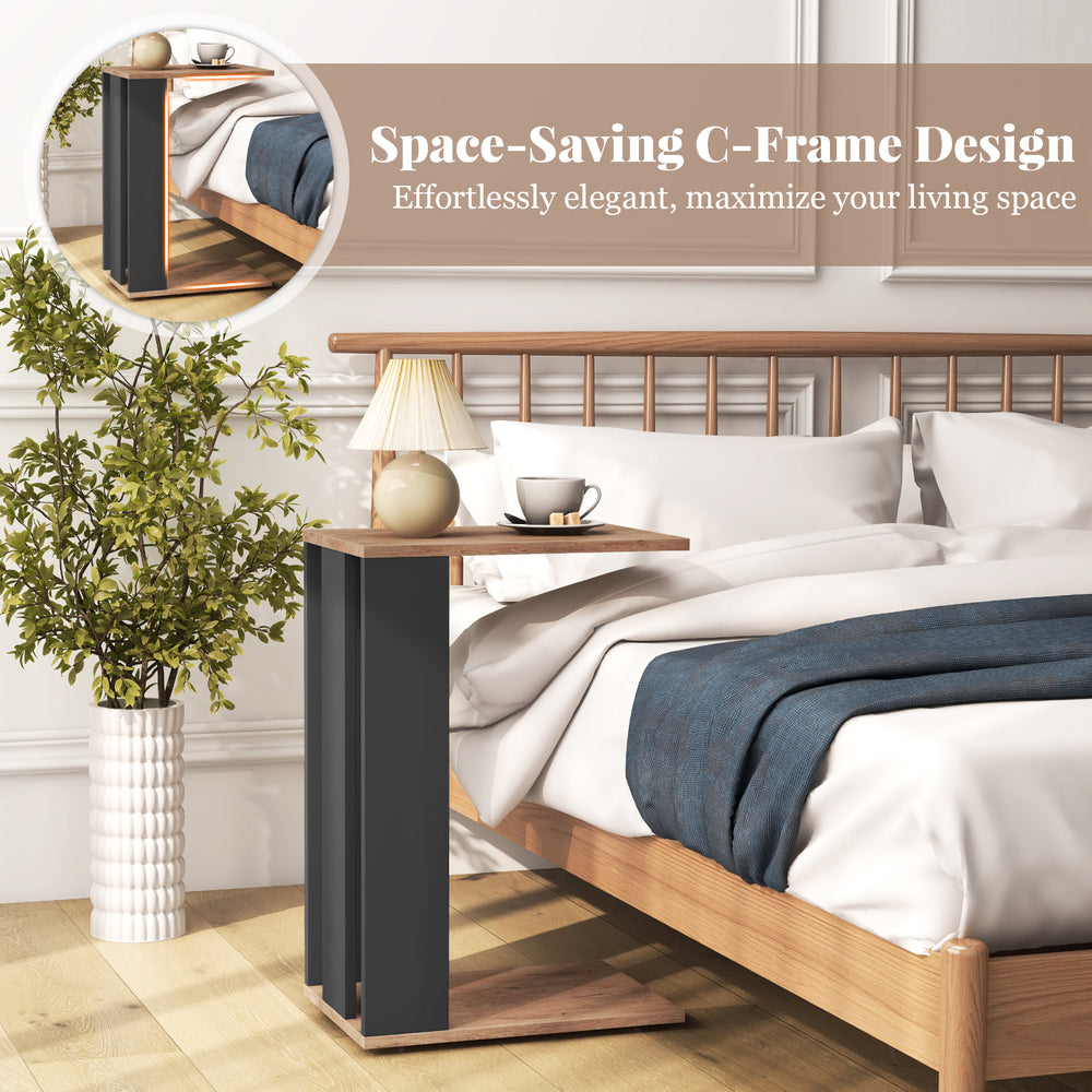 C-shaped side table in rustic brown with dual-level storage and universal wheels, perfect for maximizing living space.