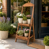 Rustic 2-tier ladder shelf made of carbonized fir wood, perfect for displaying potted plants in living rooms or balconies.