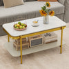 Modern rectangular coffee table with a white sintered stone top and gold metal frame, featuring an open storage shelf.