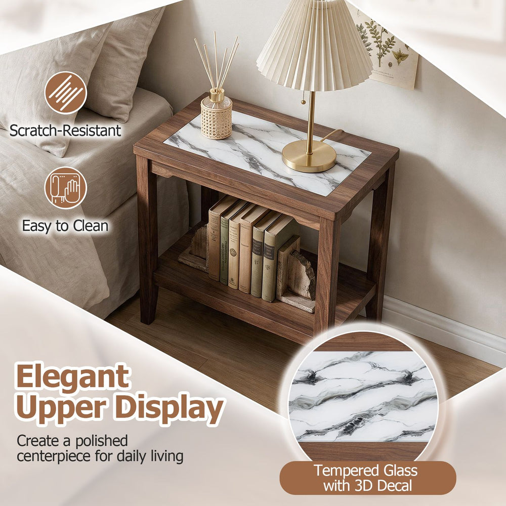 Walnut 2-tier narrow side table with tempered glass top and open storage shelf, shown beside a sofa.