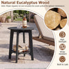 Black 2-tier outdoor side table made of natural eucalyptus wood features a slatted tabletop and storage shelf for organization.