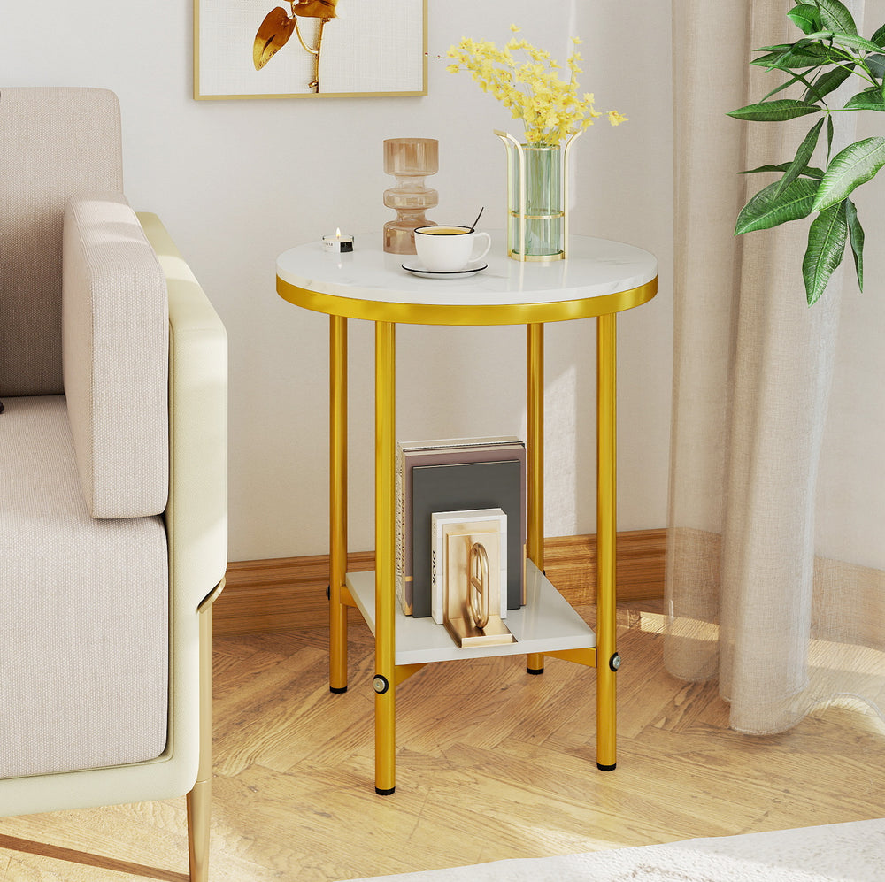 Round coffee table with faux marble top and golden metal frame, featuring a storage shelf for books and decor.