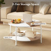 2-tier round coffee table with a split-color tabletop and metal frame, featuring an open shelf for storage and.