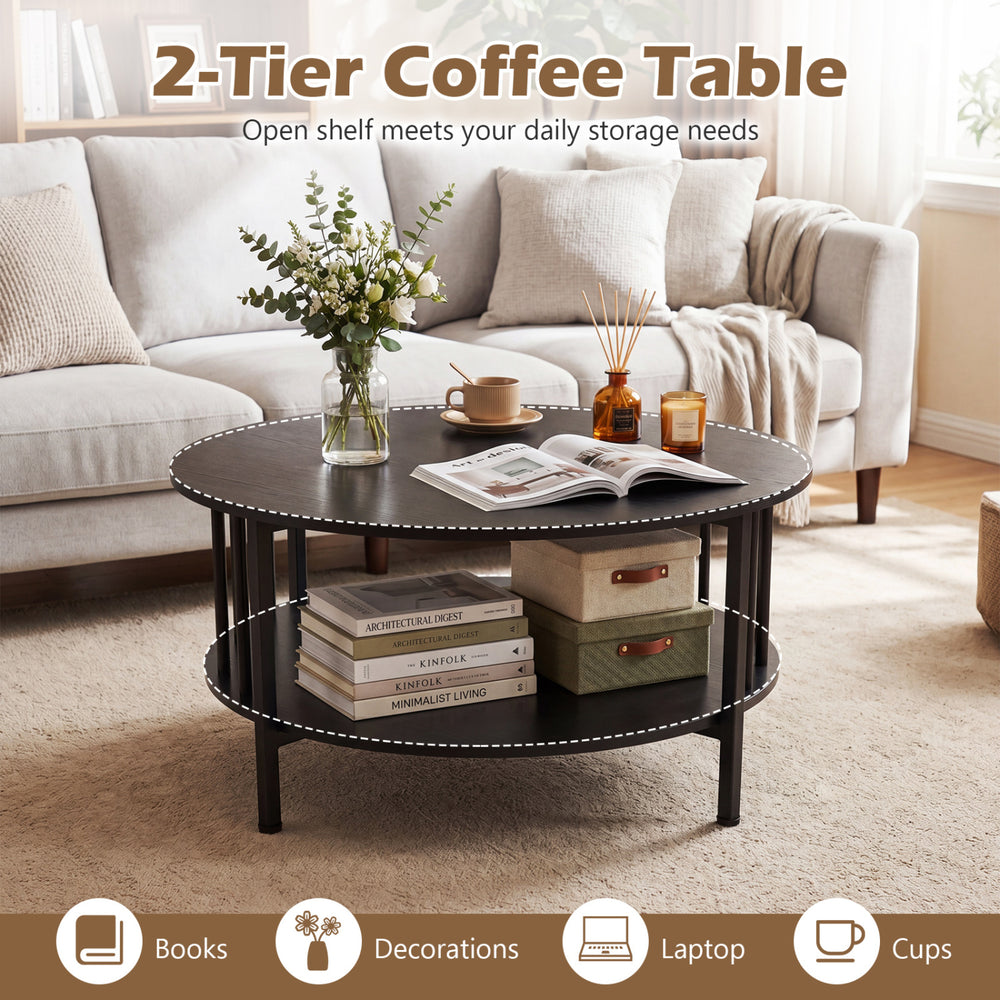 2-tier round coffee table in black walnut with open shelf, ideal for books and decorations in a living room setting.