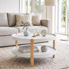 Round coffee table with solid beech wood legs and open storage shelf, perfect for organizing items in the living room.