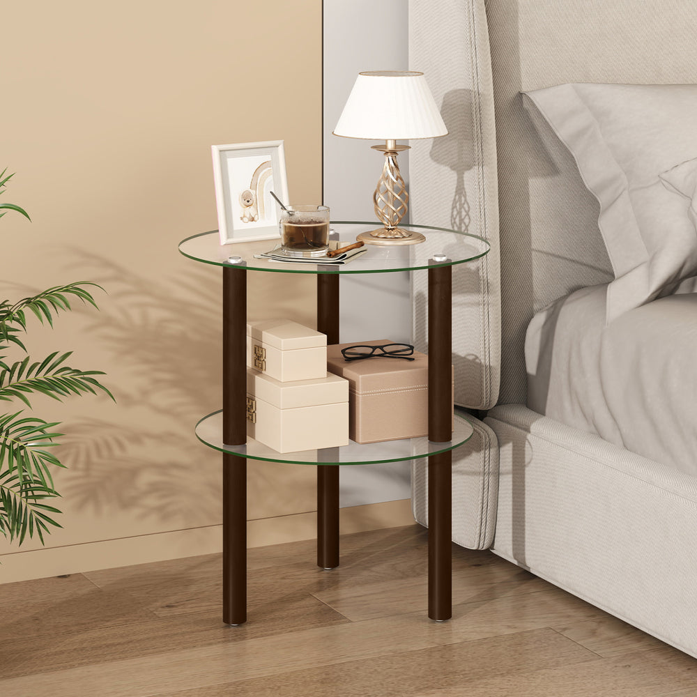 Round end table with clear tempered glass top and brown rubber wood legs, featuring a 2-tier design for versatile storage.