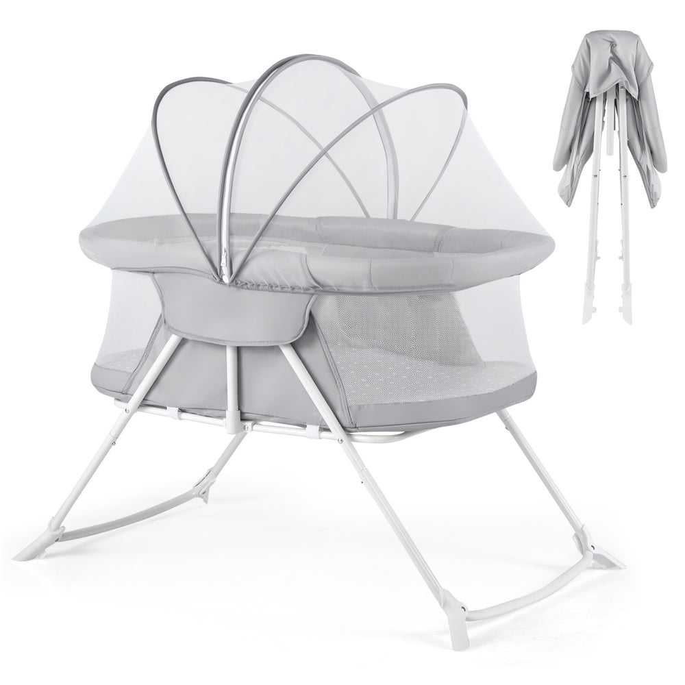 2-in-1 baby bassinet in grey with breathable mesh, foldable design, and rocking motion for safe sleep.
