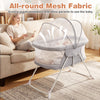 Baby bassinet in grey with all-round mesh fabric for ventilation, featuring a zippered canopy for extra protection.