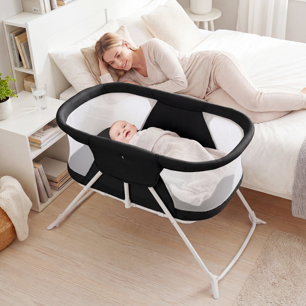 2 in 1 Baby Bassinet with Rocking Motion Foldable Bedside Sleeper with Breathable Mesh-Black - Gallery View 1 of 10