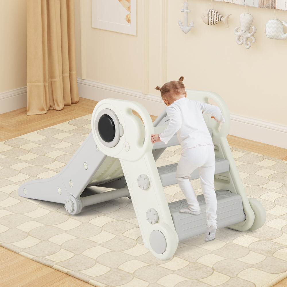 Toddler climbing slide in gray with safety guardrails, designed for fun and skill development for ages 18+ months.