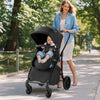2-in-1 baby stroller in black with adjustable canopy and reversible seat, perfect for outdoor walks and easy transport.