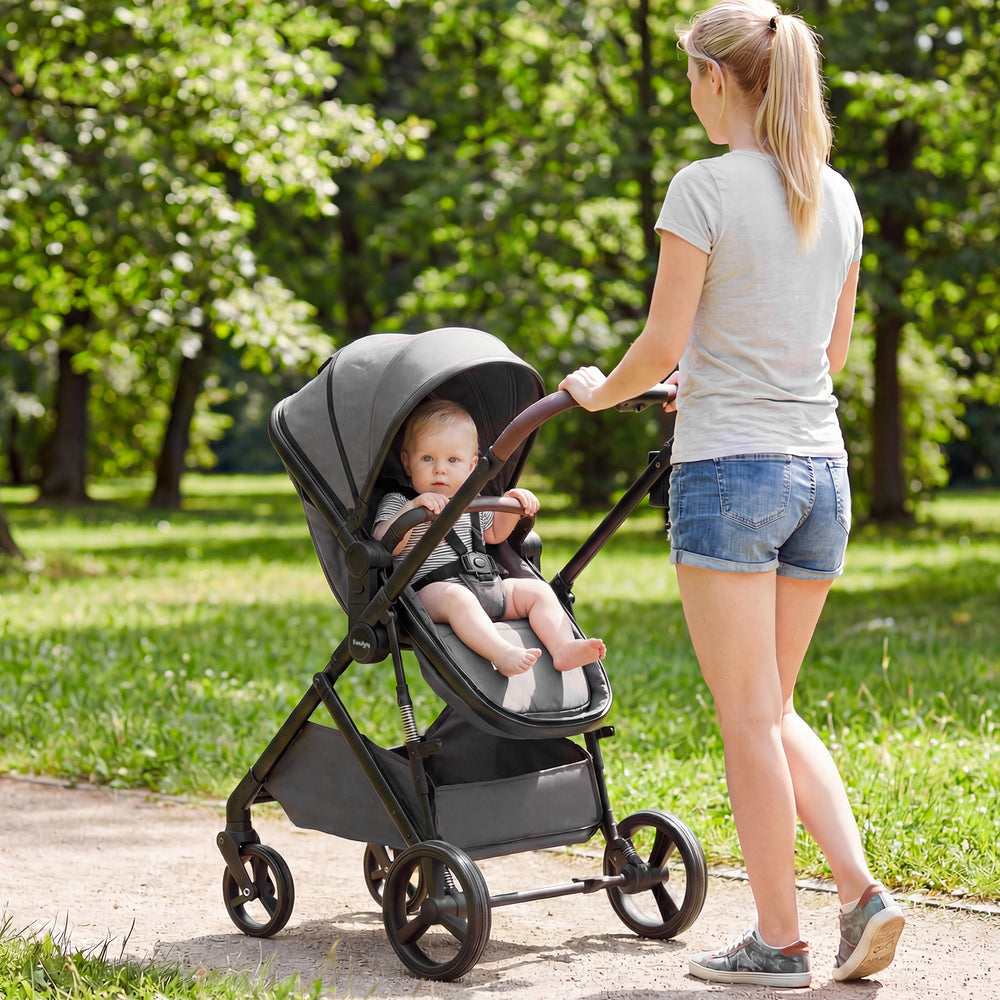 2 in 1 baby stroller in gray with adjustable canopy, bassinet mode, and EVA all-terrain wheels for smooth outdoor rides.