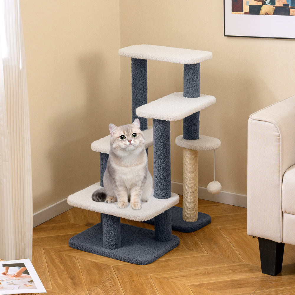 Cat tree tower with scratching posts and plush platforms in gray, perfect for climbing and play for small pets.