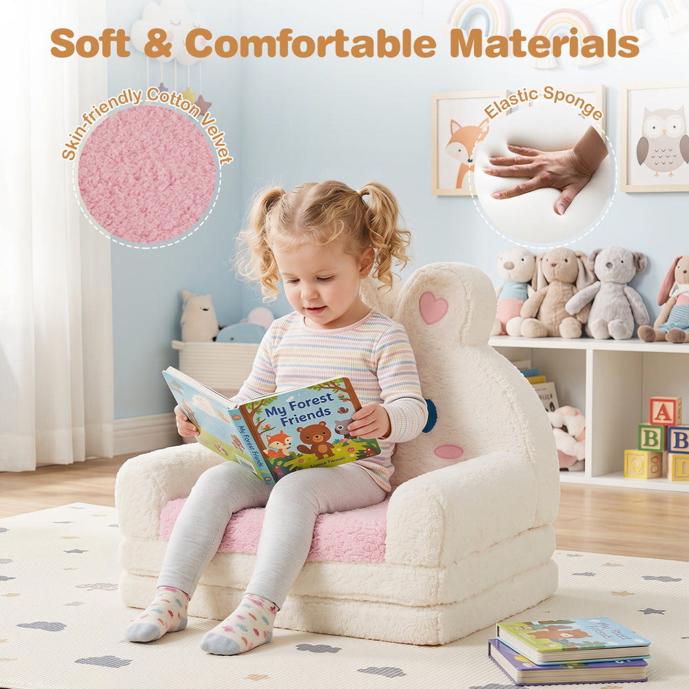 Convertible kids sofa in pink with bunny pattern, featuring soft cotton and elastic sponge for comfort while reading.