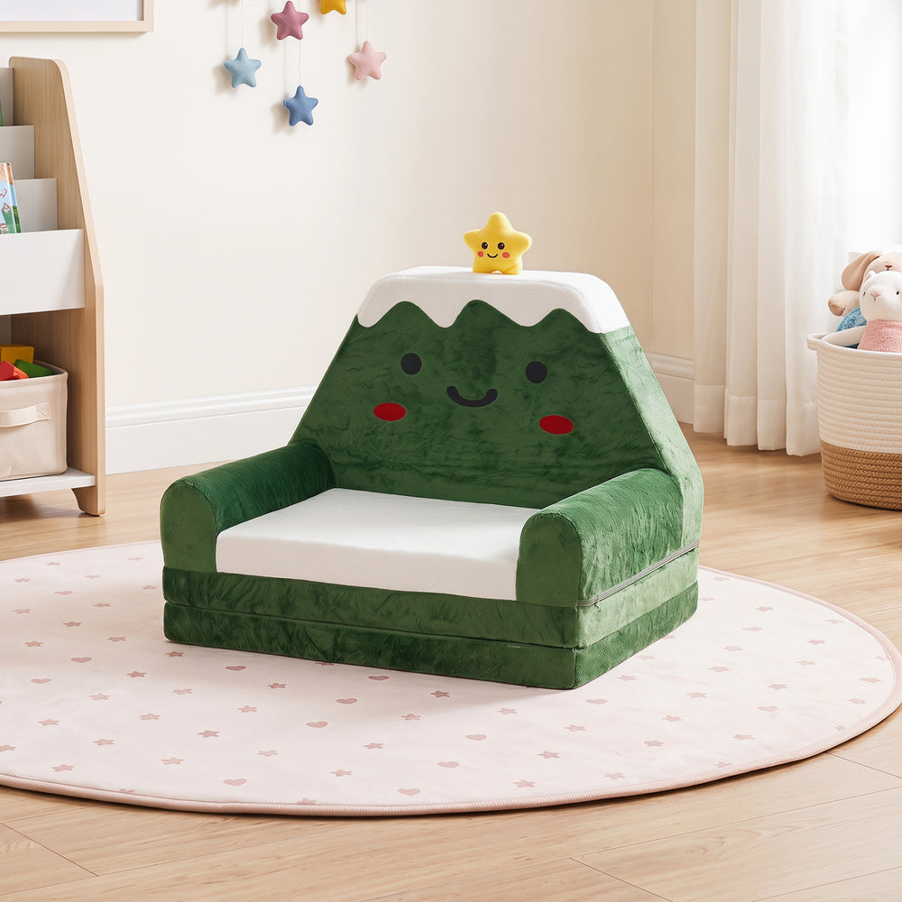 Convertible kids sofa in green with Christmas patterns, featuring a mountain design, perfect for playtime and lounging.