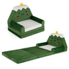 Convertible kids sofa in green with Christmas patterns, transforms into a lounger for playful relaxation.