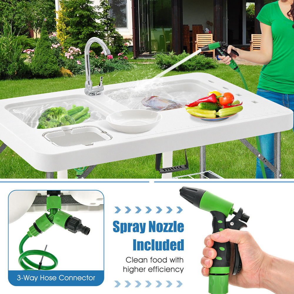 Folding fish cleaning table with double sinks, 360° rotatable faucet, and included spray nozzle for efficient outdoor.